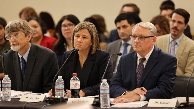 people giving testimony before a congressional hearing