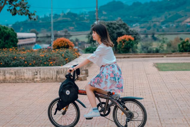 Example image: young girl on bike