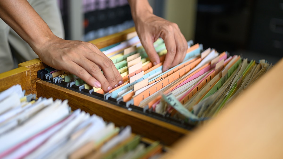 File organizer image with hands.