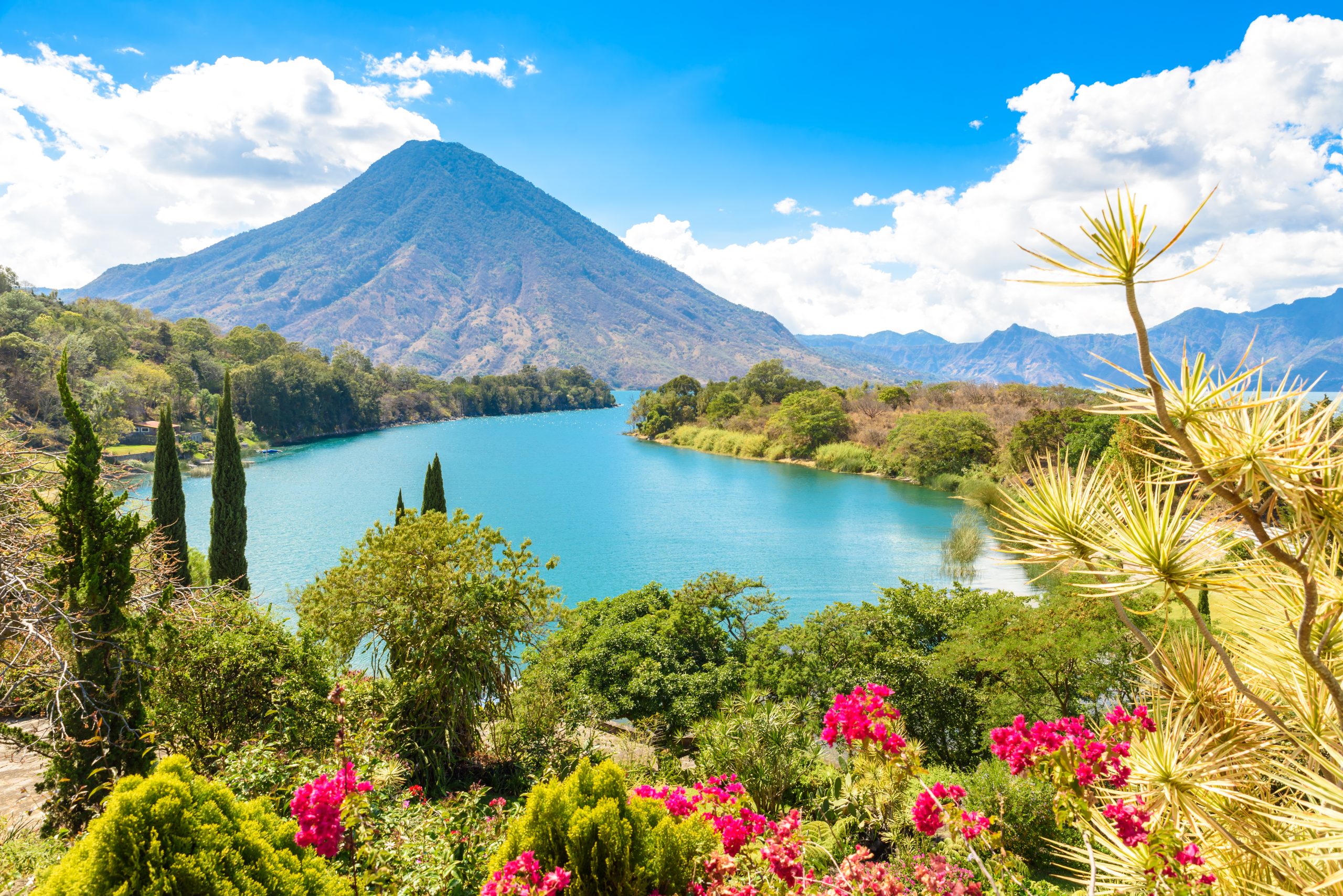 Bay of Lake Atitlan with a view of Volcano San Pedro in Guatemala, Central America.