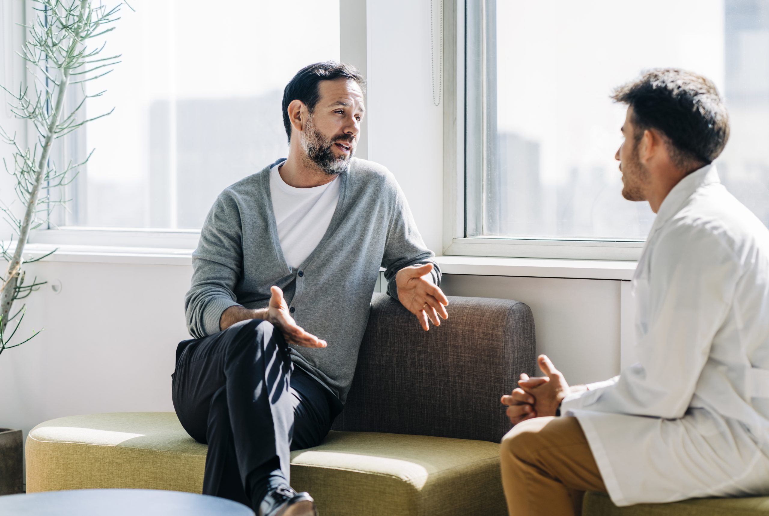 Traveler talking to a healthcare professional.