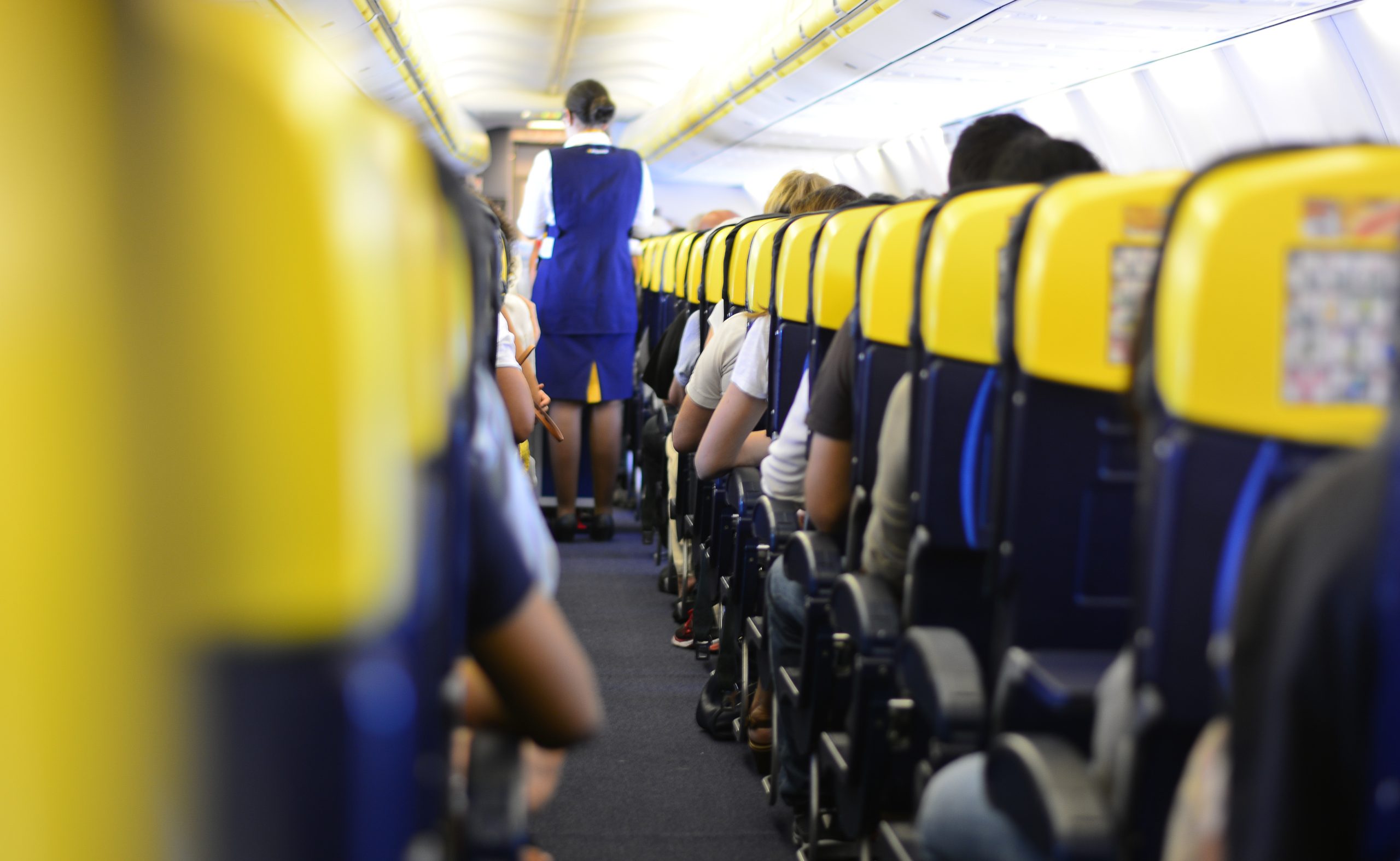 Airplane aisle and seats.
