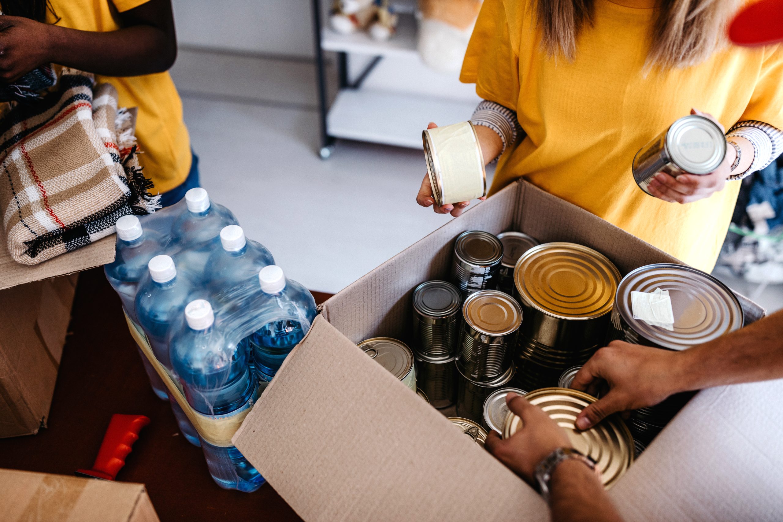 Humanitarian aid workers packing supplies.