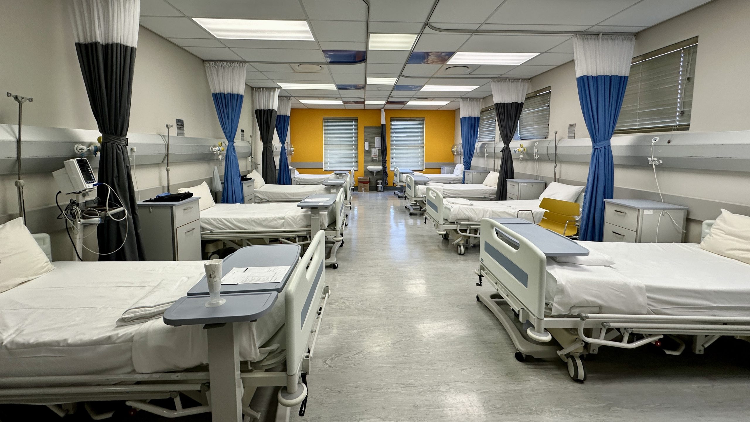 A hospital with empty beds.